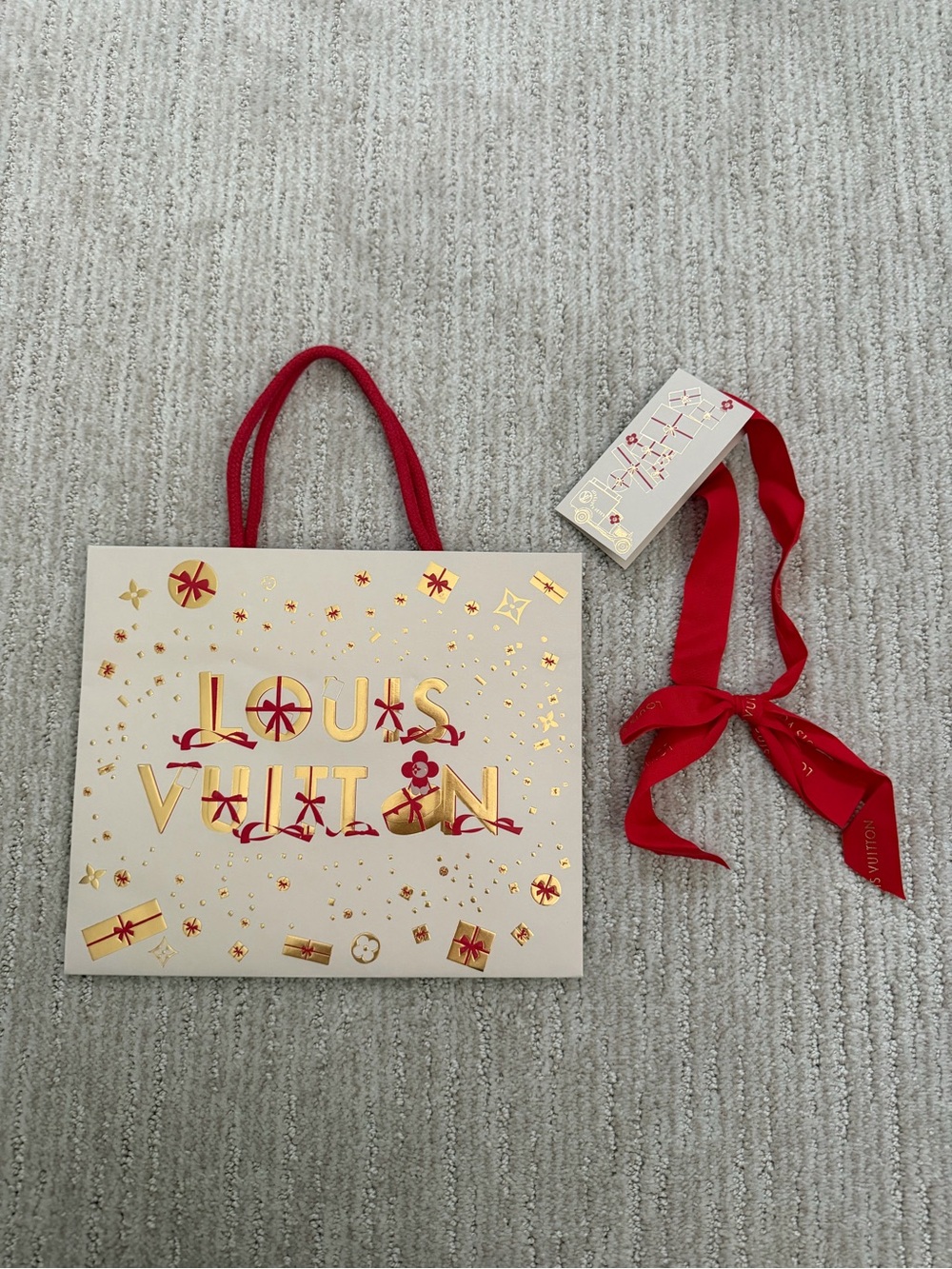 Louis Vuitton Cream and Red Holiday Gift Tote with Gold Foil Accents and ribbon